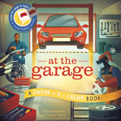 At The Garage: A shine-a-light book by Carron Brown